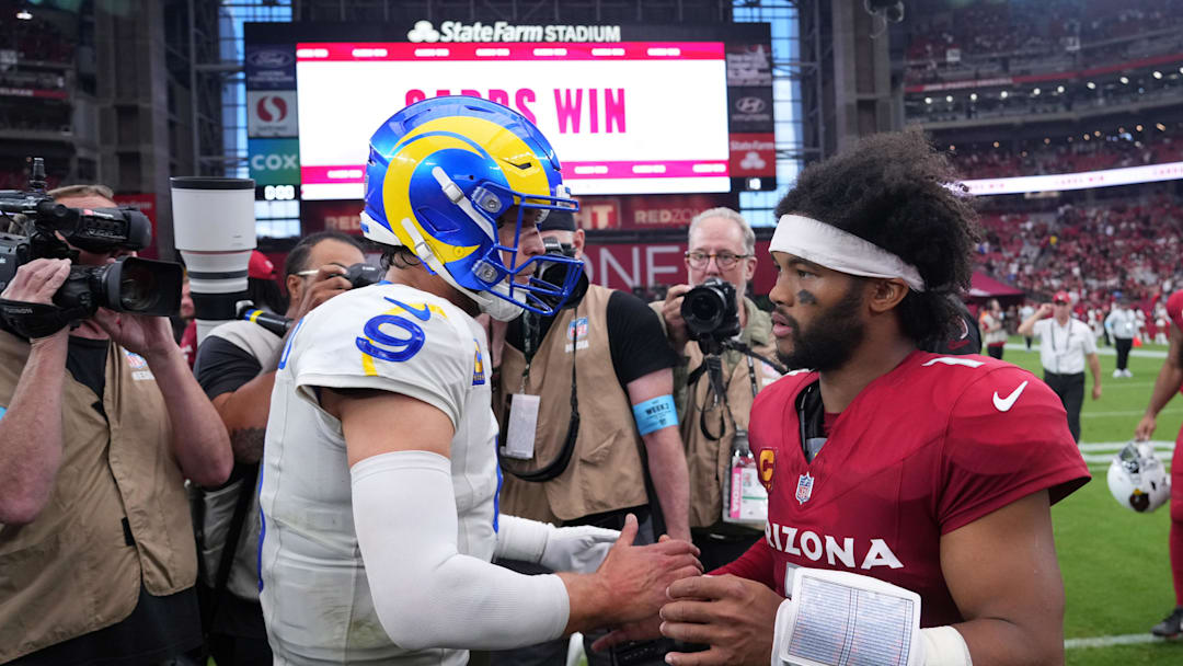 Sep 15, 2024; Glendale, Arizona, USA; Los Angeles Rams quarterback Matthew Stafford (9) and Arizona Cardinals quarterback Kyler Murray (1) shake hands after the game at State Farm Stadium. Mandatory Credit: Joe Camporeale-Imagn Images