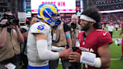 Sep 15, 2024; Glendale, Arizona, USA; Los Angeles Rams quarterback Matthew Stafford (9) and Arizona Cardinals quarterback Kyler Murray (1) shake hands after the game at State Farm Stadium. Mandatory Credit: Joe Camporeale-Imagn Images