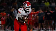 Senior running back Damian Moore (7) and the Edgewater Eagles put their undefeated record on the line in a Class 5A playoff battle with Tampa Bay Tech.