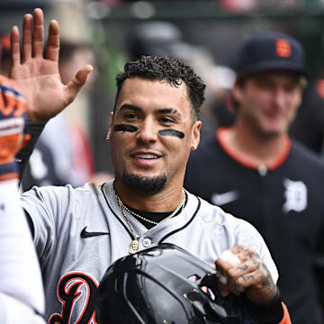 May 4, 2025; Anaheim, California, USA; Detroit Tigers outfielder Javier Baez (28) celebrates with teammates after scoring against the Los Angeles Angels during the sixth inning at Angel Stadium. 