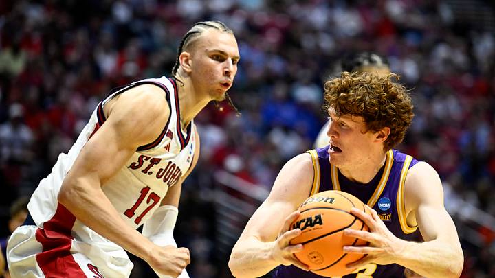 Mar 20, 2026; San Diego, CA, USA; Northern Iowa Panthers forward Will Hornseth (13) controls the ball against St. John's Red Storm forward Rubén Prey (17) in the second half during a first round game of the men's 2026 NCAA Tournament at Viejas Arena.