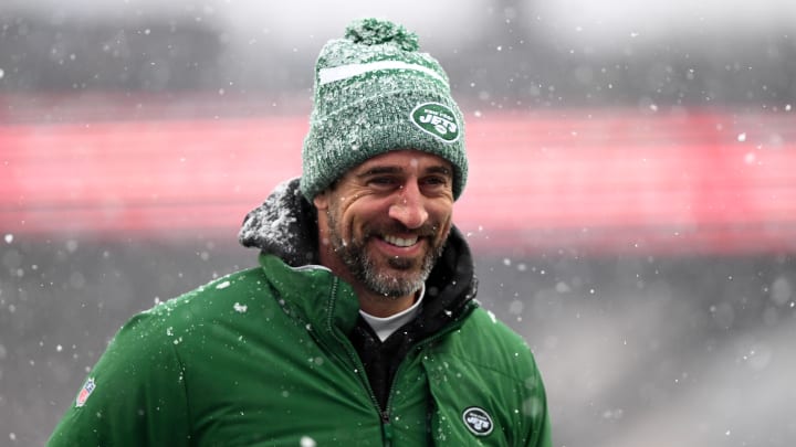 New York Jets quarterback Aaron Rodgers (8)  walks off of the field before a game against the New England Patriots at Gillette Stadium