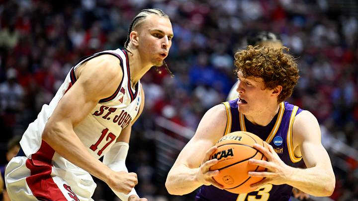 Mar 20, 2026; San Diego, CA, USA; Northern Iowa Panthers forward Will Hornseth (13) controls the ball against St. John's Red Storm forward Rubén Prey (17) in the second half during a first round game of the men's 2026 NCAA Tournament at Viejas Arena. Mandatory Credit: Denis Poroy-Imagn Images
