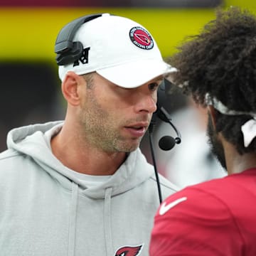 Sep 15, 2024; Glendale, Arizona, USA; Arizona Cardinals head coach Jonathan Gannon talks with Arizona Cardinals quarterback Kyler Murray (1) during the second half against the Los Angeles Rams at State Farm Stadium. Mandatory Credit: Joe Camporeale-Imagn Images