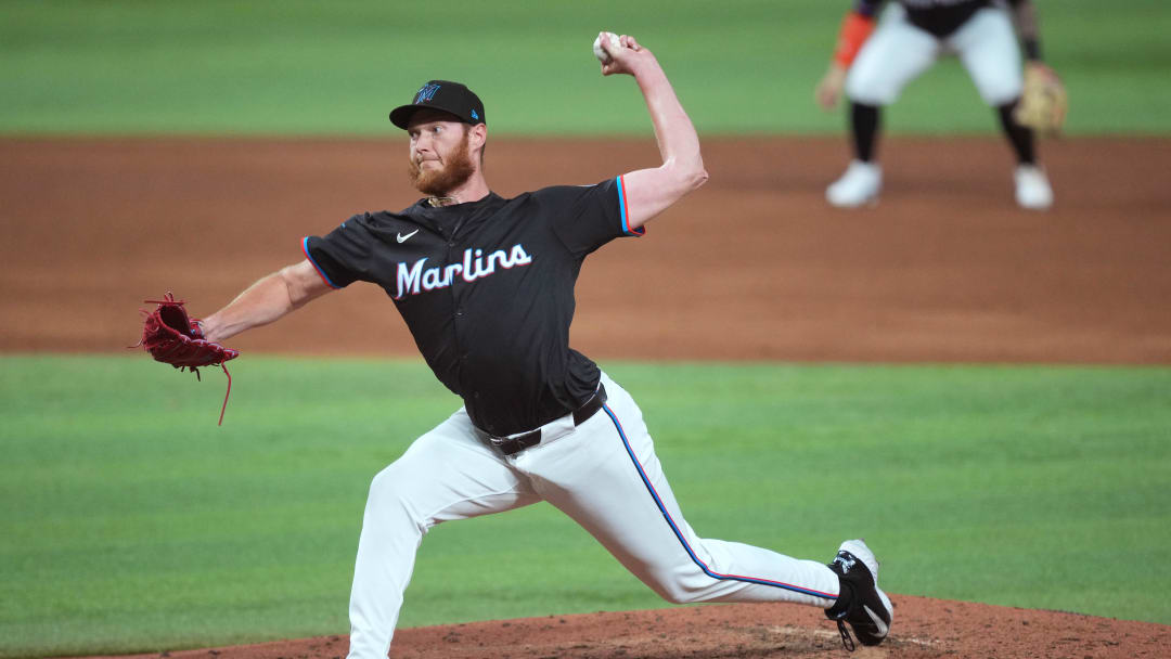 May 31, 2024; Miami, Florida, USA;  Miami Marlins pitcher A.J. Puk (35) pitches against the Texas Rangers in the seventh inning at loanDepot Park. Mandatory Credit: Jim Rassol-USA TODAY Sports