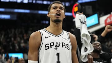 Oct 30, 2025; San Antonio, Texas, USA; San Antonio Spurs forward Victor Wembanyama (1) chants “Go Spurs Go” along with fans after a victory over the Miami Heat at Frost Bank Center. Mandatory Credit: Scott Wachter-Imagn Images