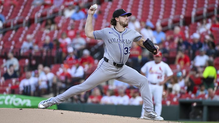 Aug 11, 2025; St. Louis, Missouri, USA;  Colorado Rockies starting pitcher Chase Dollander (32) pitches against the St. Louis Cardinals during the first inning at Busch Stadium. 