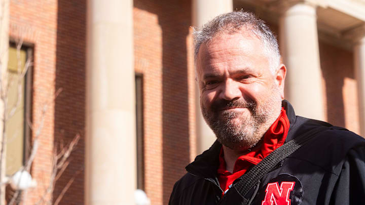 Nov 23, 2024; Lincoln, Nebraska, USA; Nebraska Cornhuskers head coach Matt Rhule walks into the stadium before the game against the Wisconsin Badgers at Memorial Stadium. Mandatory Credit: Dylan Widger-Imagn Images