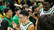 Mar 4, 2025; Eugene, Oregon, USA; Oregon Ducks guard Jackson Shelstad (3) is congratulated by fans after a 73-64 win against the Indiana Hoosiers at Matthew Knight Arena. Mandatory Credit: Craig Strobeck-Imagn Images