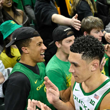 Mar 4, 2025; Eugene, Oregon, USA; Oregon Ducks guard Jackson Shelstad (3) is congratulated by fans after a 73-64 win against the Indiana Hoosiers at Matthew Knight Arena. Mandatory Credit: Craig Strobeck-Imagn Images