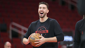 Nov 14, 2025; Houston, Texas, USA;  Houston Rockets center Alperen Sengun (28) smiles on the court before the game against the Portland Trail Blazers at Toyota Center. Mandatory Credit: Troy Taormina-Imagn Images