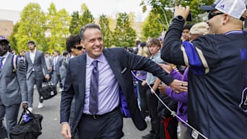 Oct 5, 2024; Seattle, Washington, USA; Washington Huskies head coach Jedd Fisch walks into Alaska Airlines Field at Husky Stadium before a game against the Michigan Wolverines. Mandatory Credit: Joe Nicholson-Imagn Images