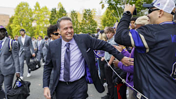 Oct 5, 2024; Seattle, Washington, USA; Washington Huskies head coach Jedd Fisch walks into Alaska Airlines Field at Husky Stadium before a game against the Michigan Wolverines. Mandatory Credit: Joe Nicholson-Imagn Images