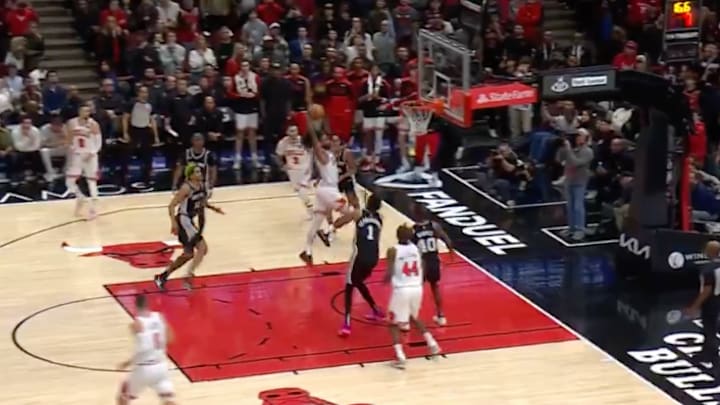 Chicago Bulls guard Coby White dunks the ball as San Antonio Spurs center Victor Wembanyama attempts to defend at th United Center on January 7, 2025. Chicago Bulls guard Coby White dunks the ball as San Antonio Spurs center Victor Wembanyama attempts to defend at th United Center on January 7, 2025.