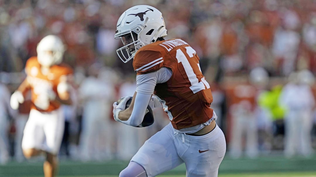 Former Texas receiver Parker Livingstone hauls in a touchdown against Arkansas.