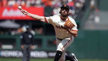 May 3, 2025; San Francisco, California, USA; San Francisco Giants relief pitcher Ryan Walker (74) throws a pitch against the Colorado Rockies during the ninth inning at Oracle Park. Mandatory Credit: Darren Yamashita-Imagn Images