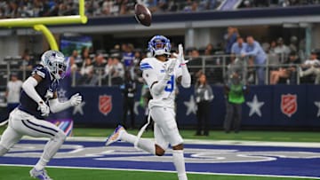 Oct 13, 2024; Arlington, Texas, USA;  Detroit Lions wide receiver Jameson Williams (9) catches a touchdown pass past Dallas Cowboys cornerback Trevon Diggs (7) during the second half at AT&T Stadium. Mandatory Credit: Kevin Jairaj-Imagn Images