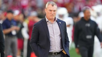 Dec 17, 2023; Glendale, Arizona, USA; San Francisco 49ers general manager John Lynch looks on prior to facing the Arizona Cardinals at State Farm Stadium. Mandatory Credit: Joe Camporeale-Imagn Images