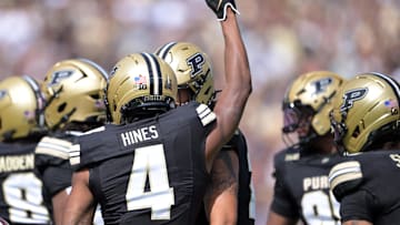 Purdue Boilermakers defensive back Hudauri Hines (4) raises a hand 