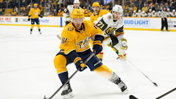 Jan 14, 2025; Nashville, Tennessee, USA;  Nashville Predators center Jonathan Marchessault (81) skates with the puck against the Vegas Golden Knights during the first period at Bridgestone Arena. Mandatory Credit: Steve Roberts-Imagn Images