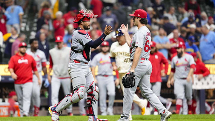 Sep 4, 2024; Milwaukee, Wisconsin, USA;  St. Louis Cardinals pitcher Ryan Fernandez (64) greets catcher Ivan Herrera (48) following the game against the Milwaukee Brewers at American Family Field. Mandatory Credit: Jeff Hanisch-Imagn Images