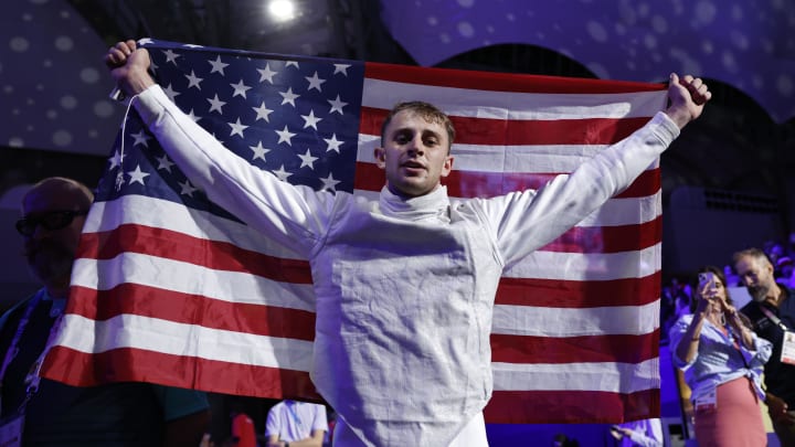 Jul 29, 2024; Paris, France;  Nick Itkin (USA) celebrates defeating Kazuki Iimura (JPN) in a men's foil bronze medal bout during the Paris 2024 Olympic Summer Games at Grand Palais. 