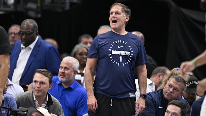 Mark Cuban watches a Mavs game at American Airlines Center. Mark Cuban watches a Mavs game at American Airlines Center.