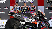 Apr 13, 2024; Austin, TX, USA; (from left) Marc Marquez (93) of Spain and Gresini Racing MotoGP and Maverick Vinales (12) of Spain and Aprilia Racing and Jorge Martin (89) of Spain and Prima Pramac Racing pose for a photo on the podium after the Americas Grand Prix sprint race at Circuit of The Americas. Mandatory Credit: Jerome Miron-Imagn Images