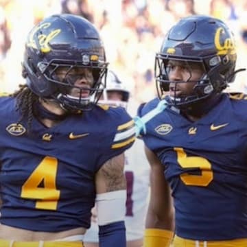 Cal cornerbacks Paco Austin (4) and Hezekiah Masses