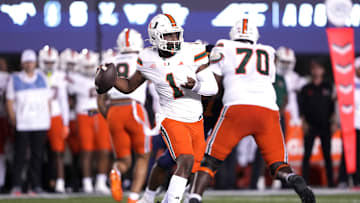 Oct 5, 2024; Berkeley, California, USA; Miami Hurricanes quarterback Cam Ward (1) throws a pass against the California Golden Bears during the first quarter at California Memorial Stadium. Mandatory Credit: Darren Yamashita-Imagn Images