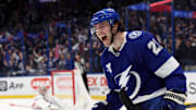 Jan 7, 2025; Tampa, Florida, USA;Tampa Bay Lightning center Brayden Point (21) celebrates after he scored the game winning goal against the Carolina Hurricanes  during the third period at Amalie Arena. Mandatory Credit: Kim Klement Neitzel-Imagn Images