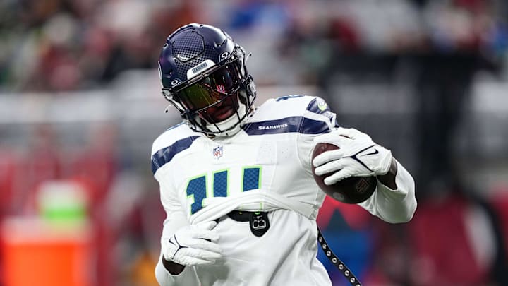 Jan 7, 2024; Glendale, Arizona, USA; Seattle Seahawks wide receiver DK Metcalf (14) warms up prior to facing the Arizona Cardinals at State Farm Stadium. Mandatory Credit: Joe Camporeale-Imagn Images