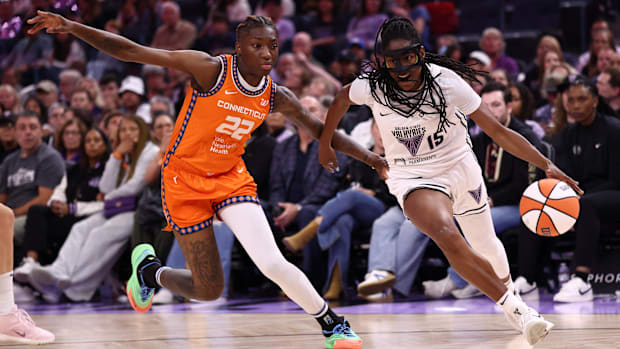 Golden State Valkyries guard Tiffany Hayes (drives in against Connecticut Sun guard Saniya Rivers.