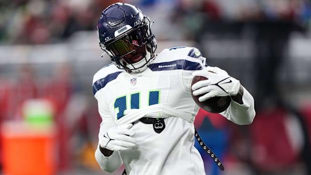 Seattle Seahawks wide receiver DK Metcalf (14) warms up prior to facing the Arizona Cardinals at State Farm Stadium.