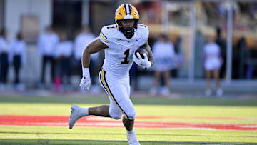 Nov 30, 2024; Dallas, Texas, USA; California Golden Bears running back Jaydn Ott (1) in action during the game between the SMU Mustangs and the California Golden Bears at Gerald J. Ford Stadium. Mandatory Credit: Jerome Miron-Imagn Images