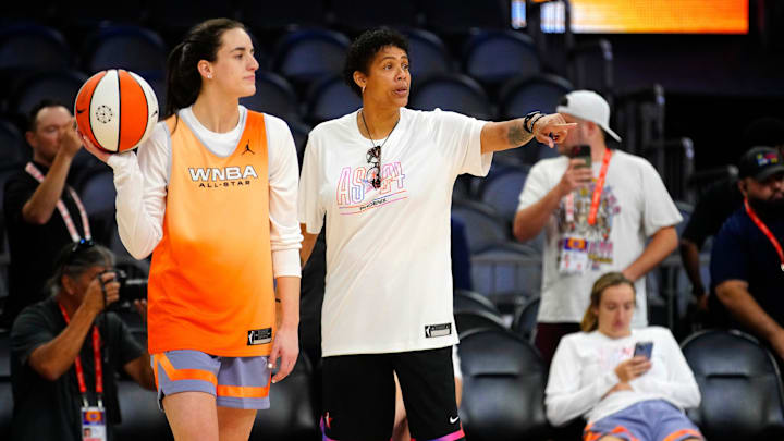 Team WNBA All-Star coach Cheryl Miller talks to Indiana Fever guard Caitlin Clark 