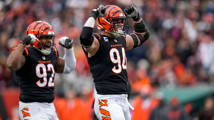Cincinnati Bengals defensive end Sam Hubbard (94) and defensive tackle BJ Hill (92) celebrate Hubbard   s sack in the first quarter of the NFL Week 18 game between the Cincinnati Bengals and the Cleveland Browns at Paycor Stadium in downtown Cincinnati on Sunday, Jan. 7, 2024.