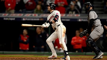 Oct 17, 2024; Cleveland, Ohio, USA; Cleveland Guardians outfielder Lane Thomas (8) doubles during the ninth inning against the New York Yankees in game 3 of the American League Championship Series at Progressive Field. Mandatory Credit: Ken Blaze-Imagn Images