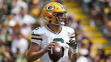 Aug 24, 2024; Green Bay, Wisconsin, USA;  Green Bay Packers quarterback Sean Clifford (6) during the game against the Baltimore Ravens at Lambeau Field. Mandatory Credit: Jeff Hanisch-Imagn Images