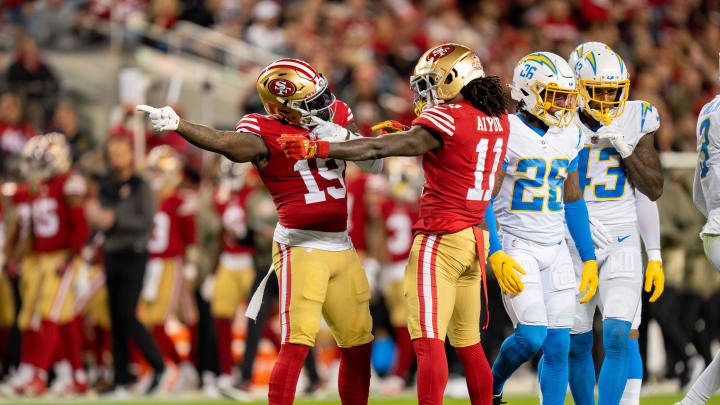 November 13, 2022; Santa Clara, California, USA; San Francisco 49ers wide receiver Deebo Samuel (19) and wide receiver Brandon Aiyuk (11) celebrate a first down against the Los Angeles Chargers during the first quarter at Levi's Stadium. Mandatory Credit: Kyle Terada-USA TODAY Sports