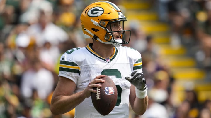 Green Bay Packers quarterback Sean Clifford throws during a preseason game against the Baltimore Ravens. 