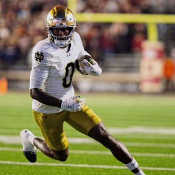 Nov 1, 2025; Chestnut Hill, Massachusetts, USA; Notre Dame Fighting Irish wide receiver Malachi Fields (0) runs after a catch in the fourth quarter against the Boston College Eagles at Alumni Stadium. Mandatory Credit: Edward Finan-Imagn Images