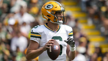 Aug 24, 2024; Green Bay, Wisconsin, USA;  Green Bay Packers quarterback Sean Clifford (6) during the game against the Baltimore Ravens at Lambeau Field. Mandatory Credit: Jeff Hanisch-USA TODAY Sports