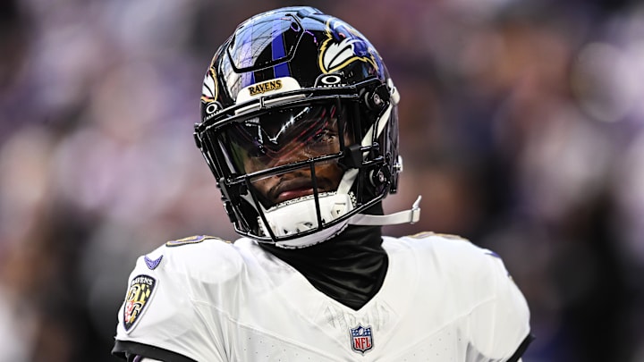 Nov 9, 2025; Minneapolis, Minnesota, USA; Baltimore Ravens quarterback Lamar Jackson (8) looks on before the game against the Minnesota Vikings at U.S. Bank Stadium. Mandatory Credit: Jeffrey Becker-Imagn Images