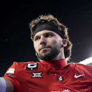 Oct 25, 2025; Cincinnati, Ohio, USA;  Cincinnati Bearcats quarterback Brendan Sorsby points to fans as he walks off the field after defeating the Baylor Bears at Nippert Stadium. Mandatory Credit: Aaron Doster-Imagn Images