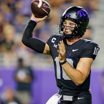 Sep 14, 2024; Fort Worth, Texas, USA; TCU Horned Frogs quarterback Josh Hoover (10) dumps the ball off during the fourth quarter against the UCF Knights at Amon G. Carter Stadium. Mandatory Credit: Andrew Dieb-Imagn Images