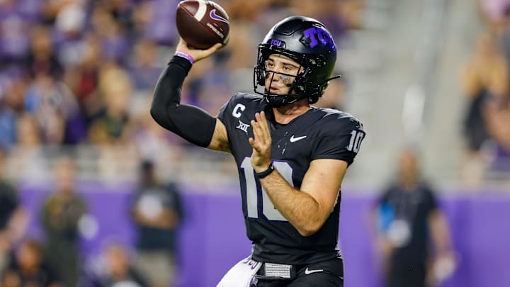 Sep 14, 2024; Fort Worth, Texas, USA; TCU Horned Frogs quarterback Josh Hoover (10) dumps the ball off during the fourth quarter against the UCF Knights at Amon G. Carter Stadium. Mandatory Credit: Andrew Dieb-Imagn Images