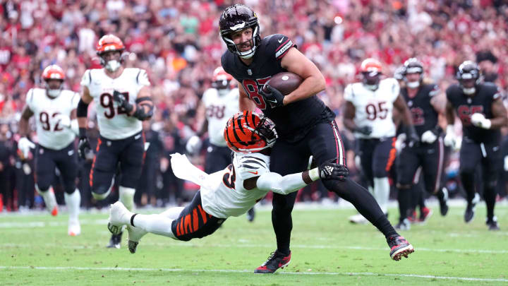 Oct 8, 2023; Glendale, Arizona, USA; Arizona Cardinals tight end Geoff Swaim (87) runs after making a catch against the Cincinnati Bengals during the first half at State Farm Stadium.
