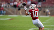 Oct 26, 2024; Stanford, California, USA;  Stanford Cardinal wide receiver Emmett Mosley V (10) catches the football against the Wake Forest Demon Deacons second quarter at Stanford Stadium. Mandatory Credit: Neville E. Guard-Imagn Images