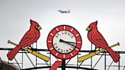 Apr 16, 2023; St. Louis, Missouri, USA;  A general view of the St. Louis Cardinals scoreboard as a plane passes by during the seventh inning of a game against the Pittsburgh Pirates at Busch Stadium. Mandatory Credit: Jeff Curry-Imagn Images